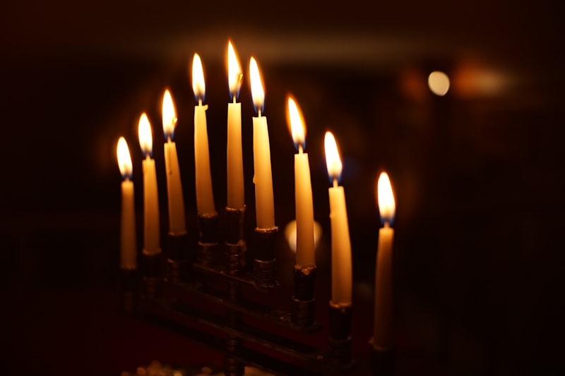 Traditional Hanukkah menorah with lit candles