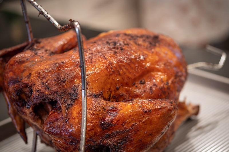 Traditional Thanksgiving dinner table with turkey and side dishes